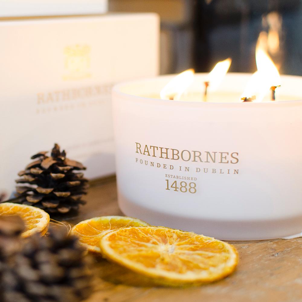 Rathborne’s Cedar Cloves & Ambergris Luxury Candle, €54 