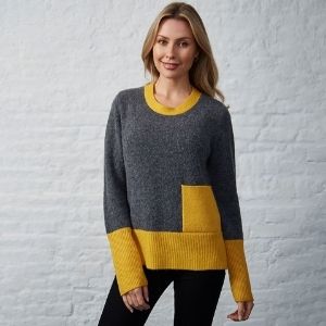 A cosy charcoal jumper with contrasting mustard neck, pocket, hem and cuffs. Wear this with jeans.