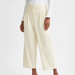 High waisted cropped cream trousers. 