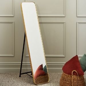 Stylish floor length mirror in gold. 