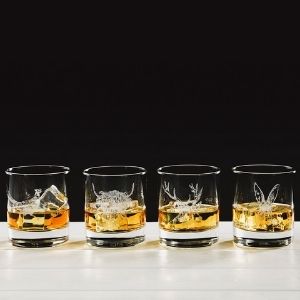Engraved tumblers suitable for whiskey and brandy.
