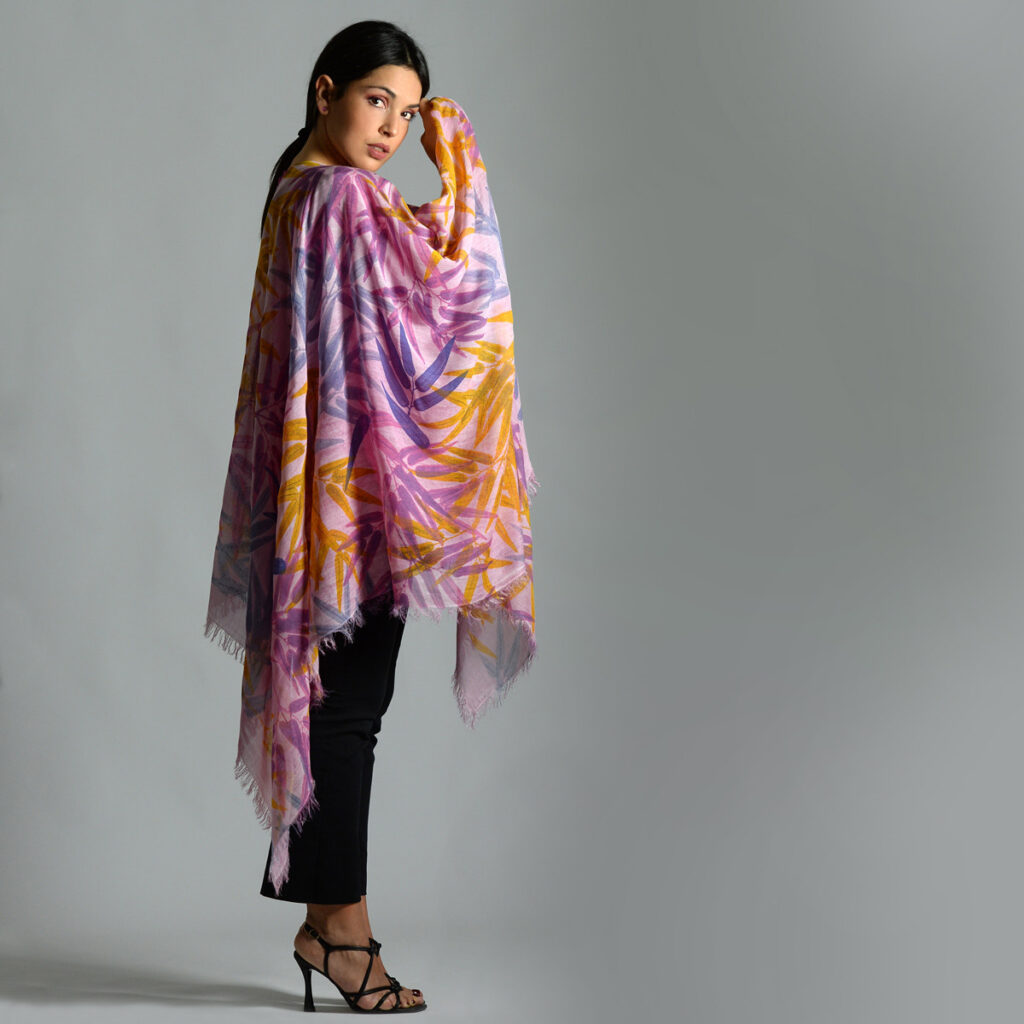 bamboo silk and tencel scarf with a bamboo inspired pattern in pink, purple, orange, blue, yellow and gold
