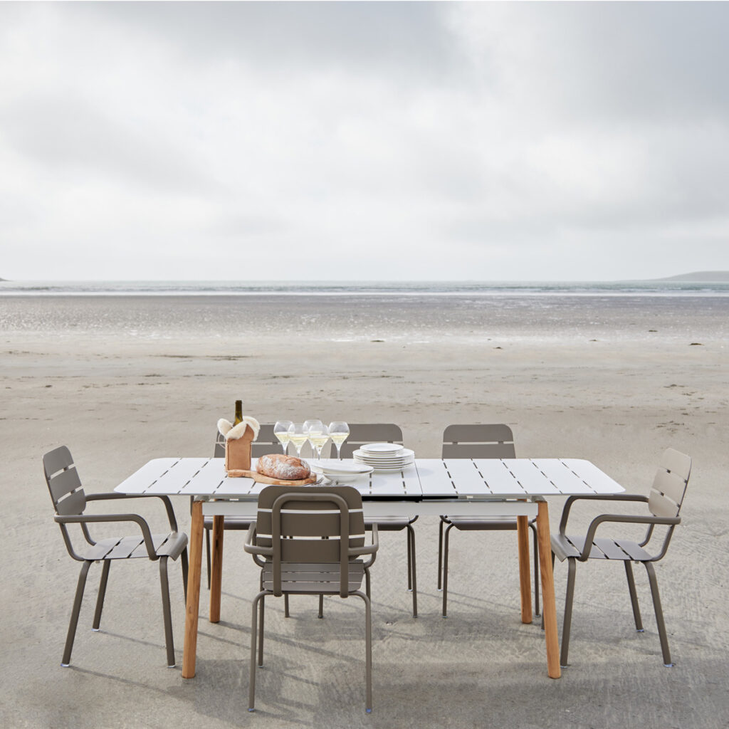 large outdoor extendable table with teak legs