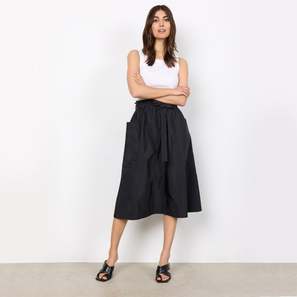 53% Recycled Polyester and 47% Organic cotton midi black skirt.
