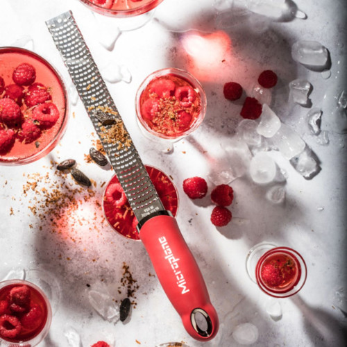 stainless-steel blade zester with a red ergonomic soft-touch handle