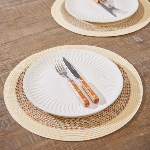 Natural Round Stripe Woven Placemat with plate and cutlery on top.